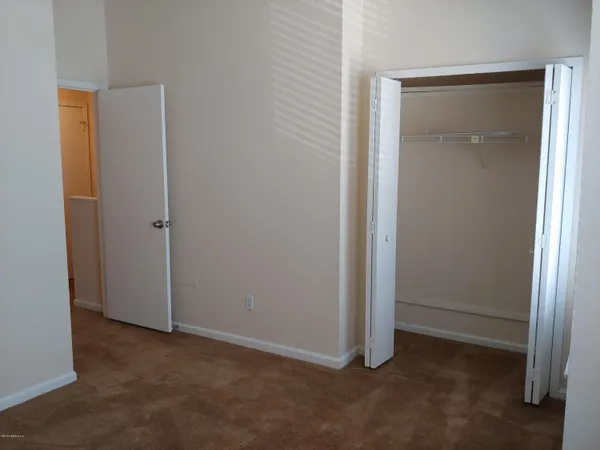 an empty room with closet