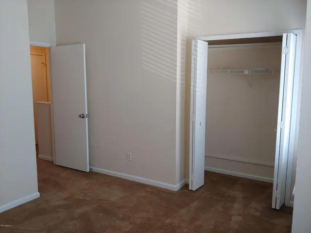 an empty room with closet