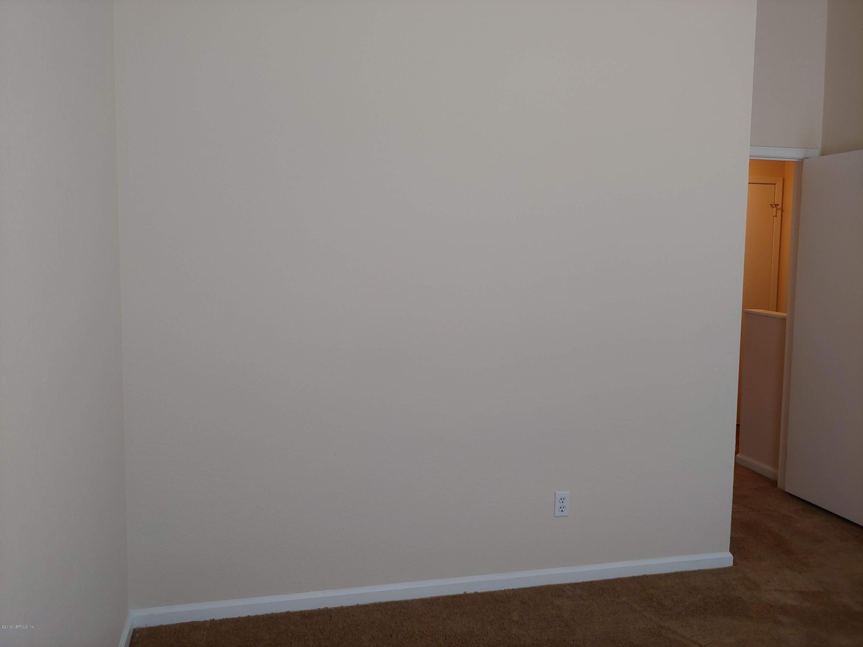 791 Assisi Lane, Unit 303 Jacksonville, FL 32233 - Photo 27 of 35 a view of small space with closet