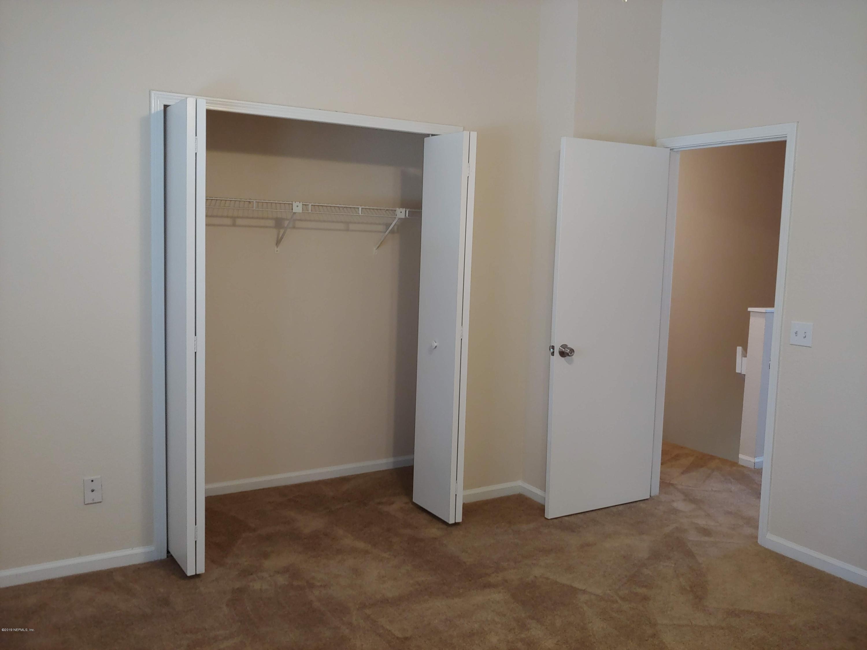 791 Assisi Lane, Unit 303 Jacksonville, FL 32233 - Photo 31 of 35 a view of an empty room