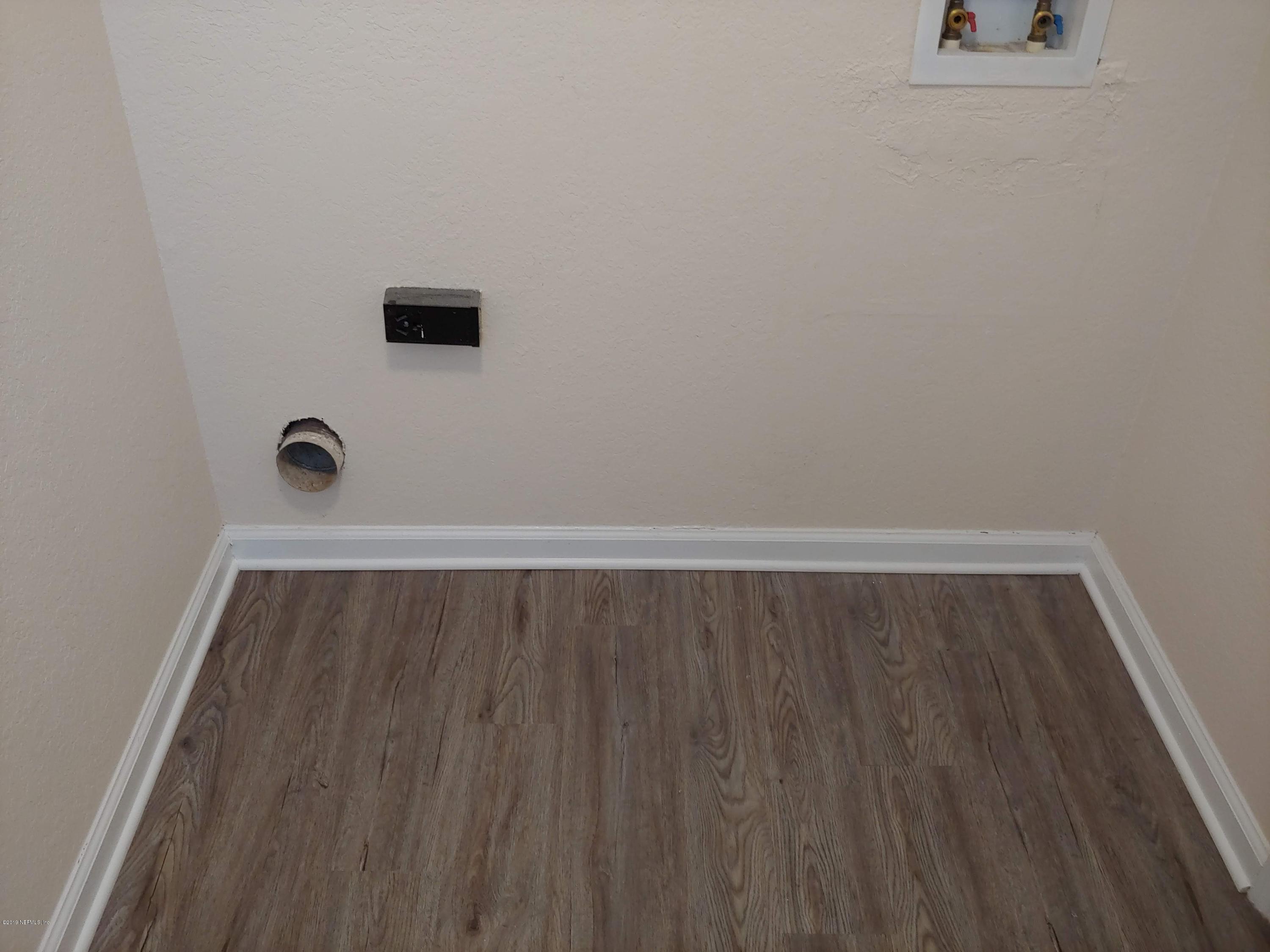 791 Assisi Lane, Unit 303 Jacksonville, FL 32233 - Photo 10 of 35 a view of wooden floor