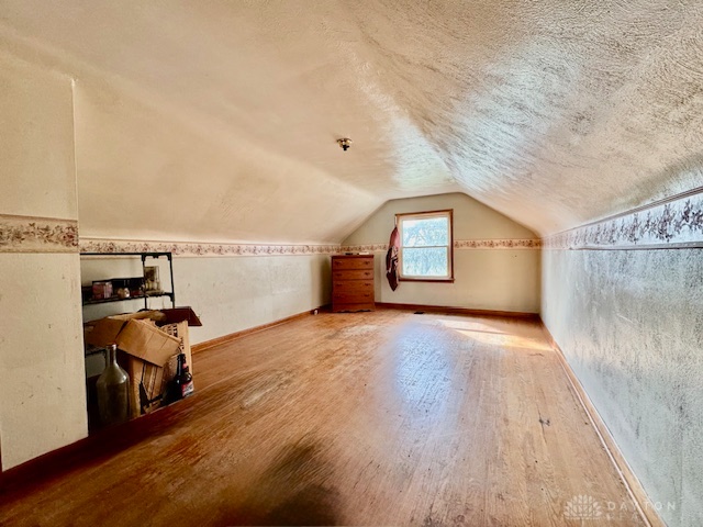 4733 Curtis Drive Springfield, OH 45503 - Photo 37 of 50 This versatile attic space offers ample room for storage or future customization, featuring hardwood flooring and natural light.