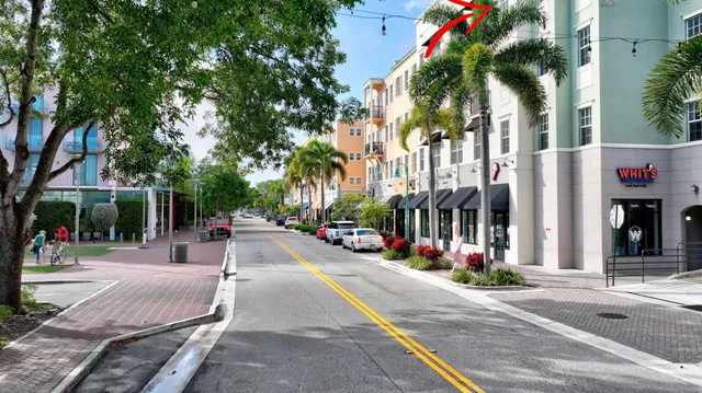 a view of tall buildings with small plants