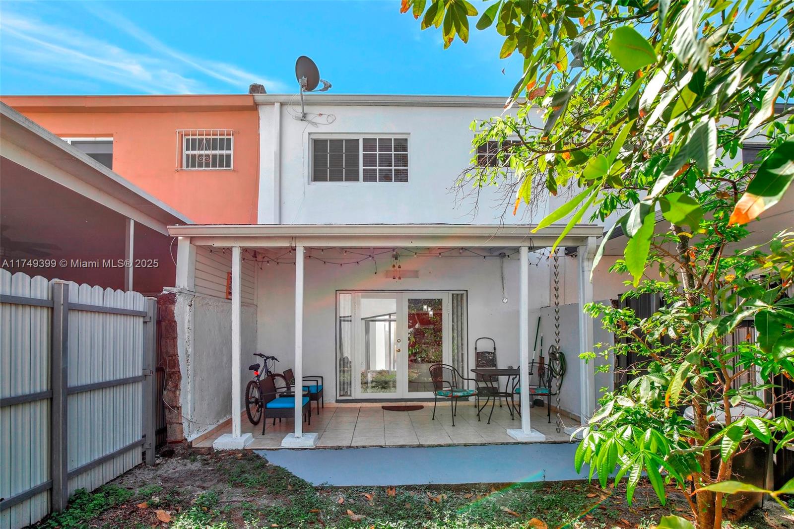 1945 West 72nd Street Hialeah, FL 33014 - Photo 21 of 24 a view of a house with patio outdoor seating area