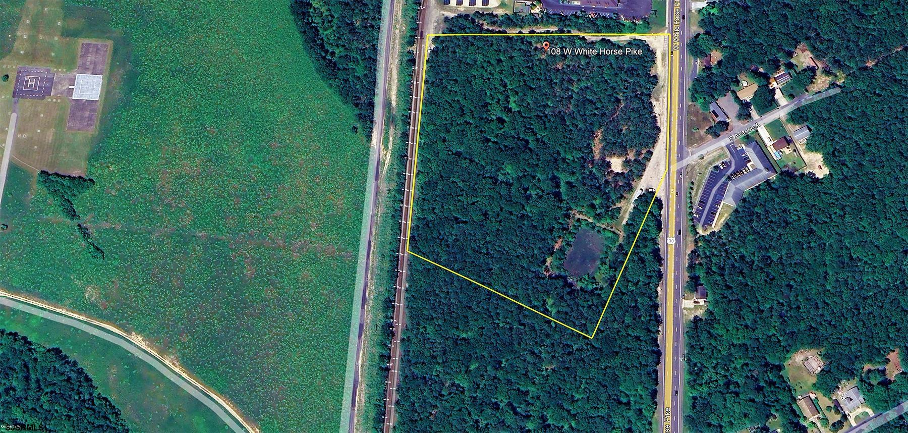 104-108 West White Horse Pike Absecon, NJ 08201 - Photo 2 of 11 a view of a backyard