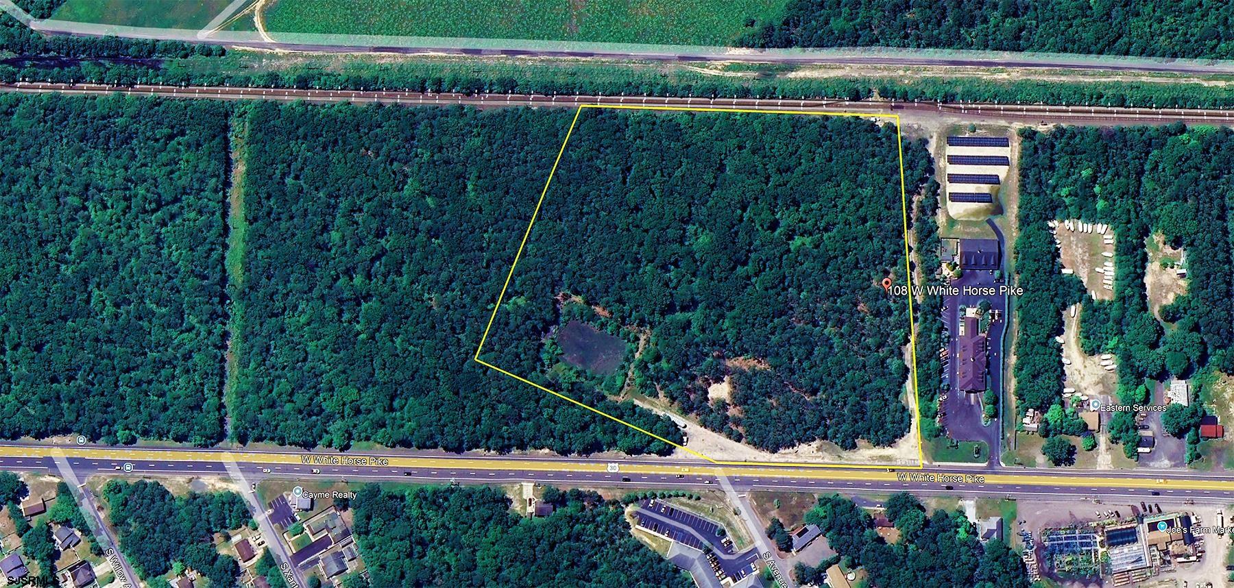 104-108 West White Horse Pike Absecon, NJ 08201 - Photo 3 of 11 a view of a pathway of a park