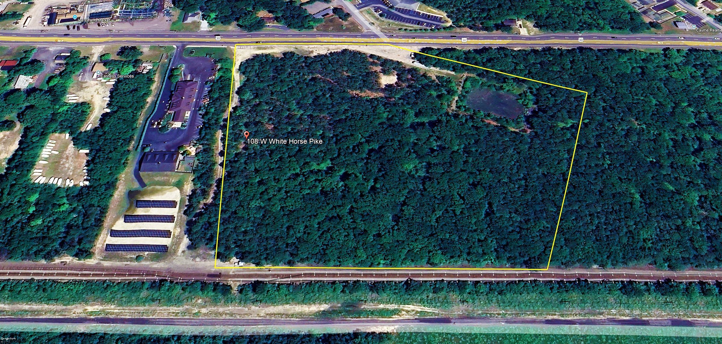 104-108 West White Horse Pike Absecon, NJ 08201 - Photo 6 of 11 a view of a yard with plants