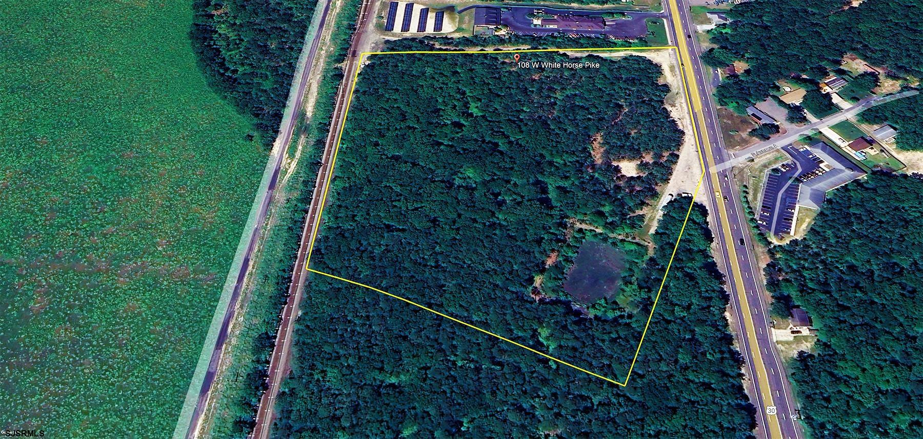 104-108 West White Horse Pike Absecon, NJ 08201 - Photo 7 of 11 a bird view of a garden