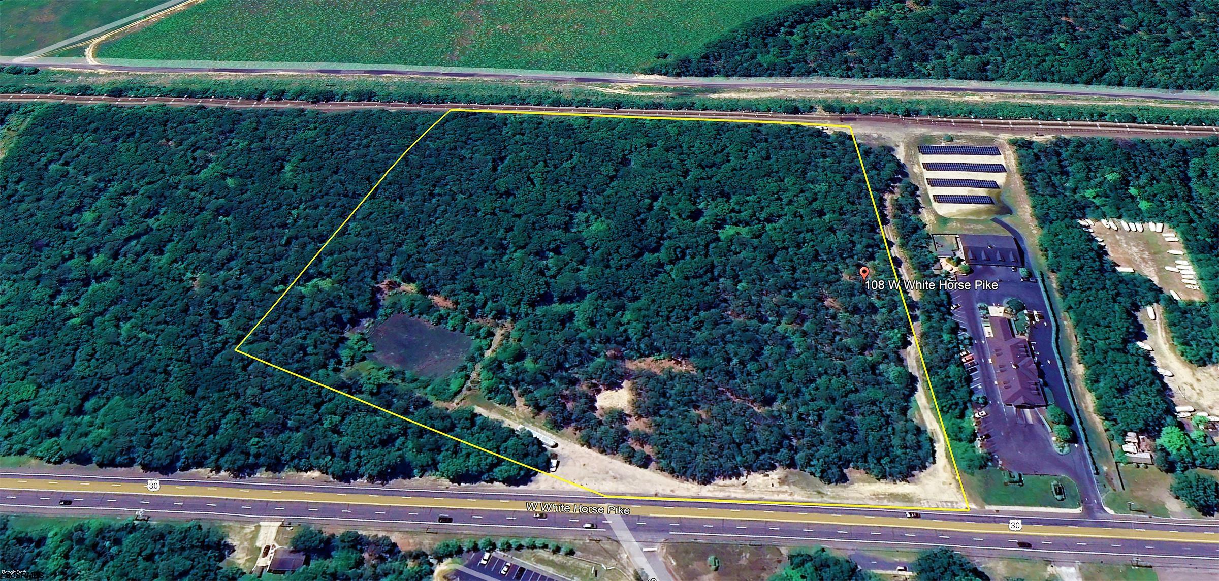 104-108 West White Horse Pike Absecon, NJ 08201 - Photo 8 of 11 a view of a backyard