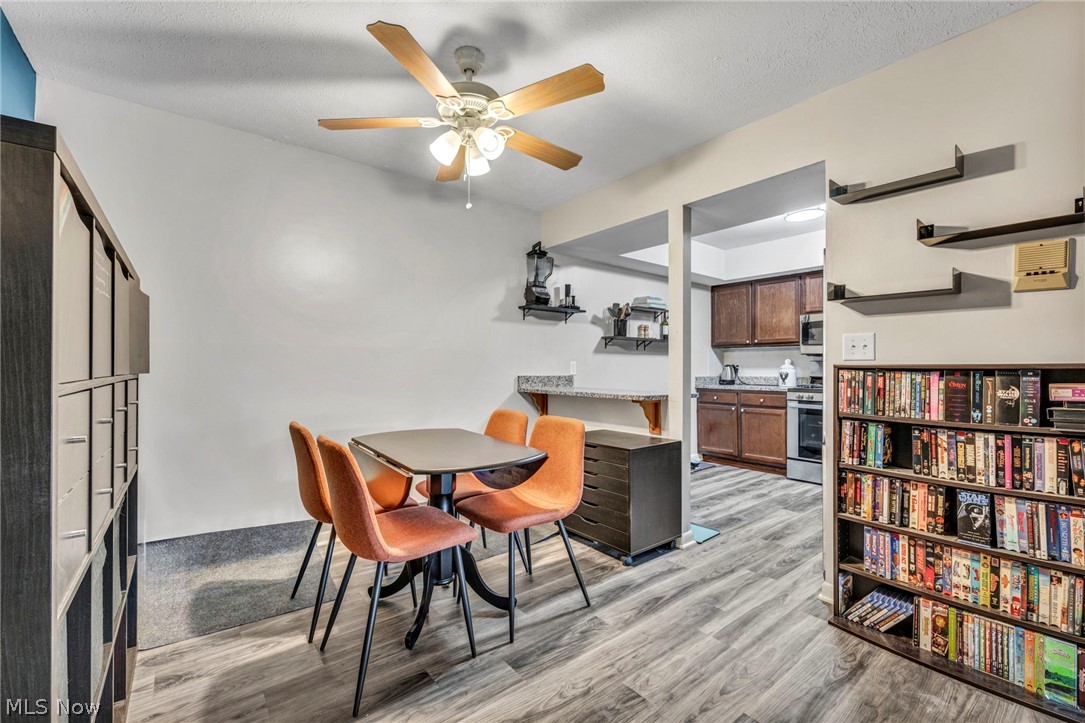 22952 Mastick Road, Unit 203 Cleveland, OH 44126 - Photo 9 of 35 Dining space with light wood-type flooring and ceiling fan