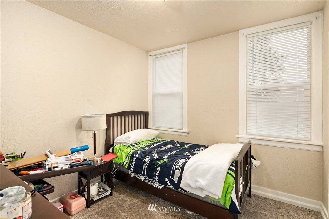 222 South 15th Street Renton, WA 98055 - Photo 23 of 34 a bedroom with a bed and a window