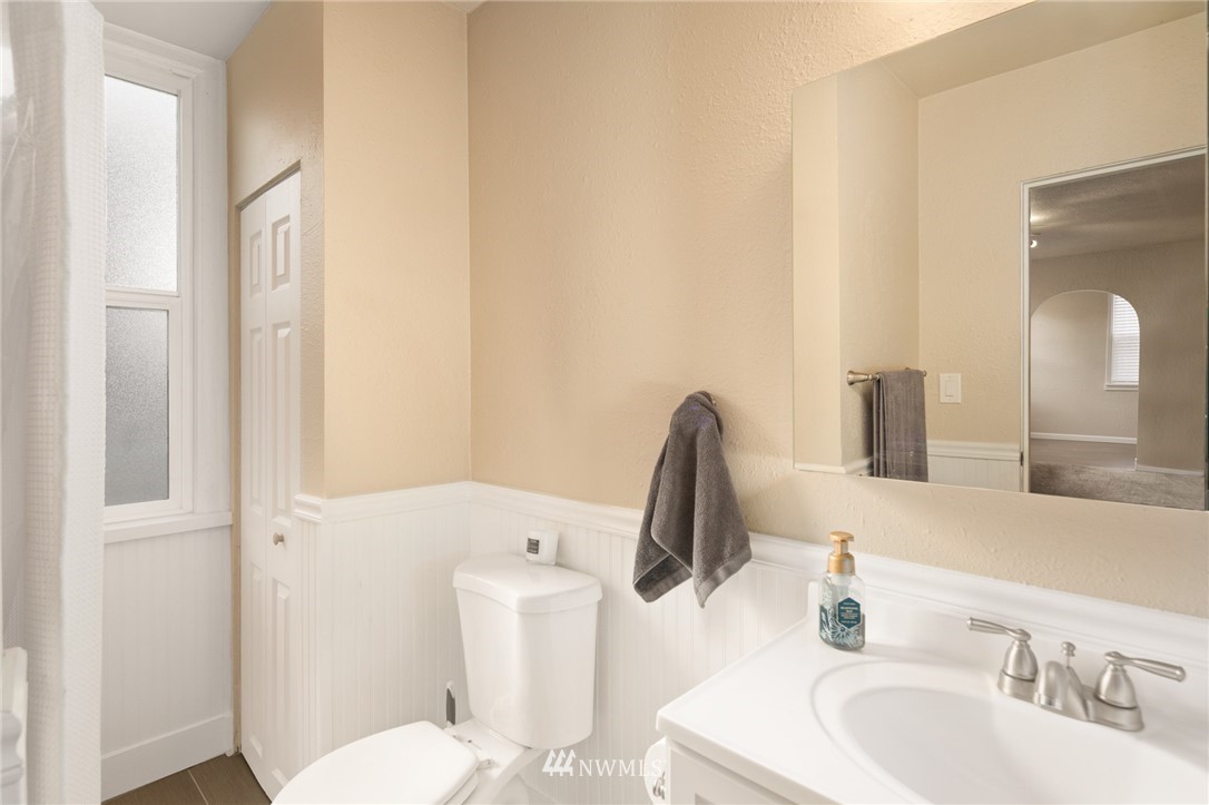 222 South 15th Street Renton, WA 98055 - Photo 24 of 34 a bathroom with a sink and a mirror