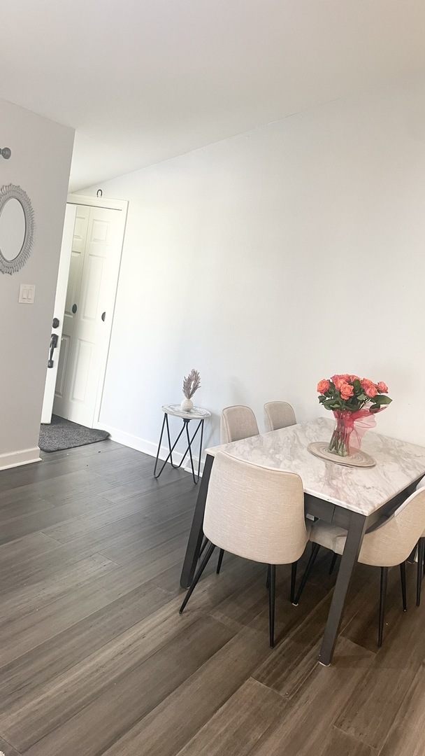 2749 Virginia Lane Glenview, IL 60025 - Photo 13 of 39 a workspace with furniture and wooden floor