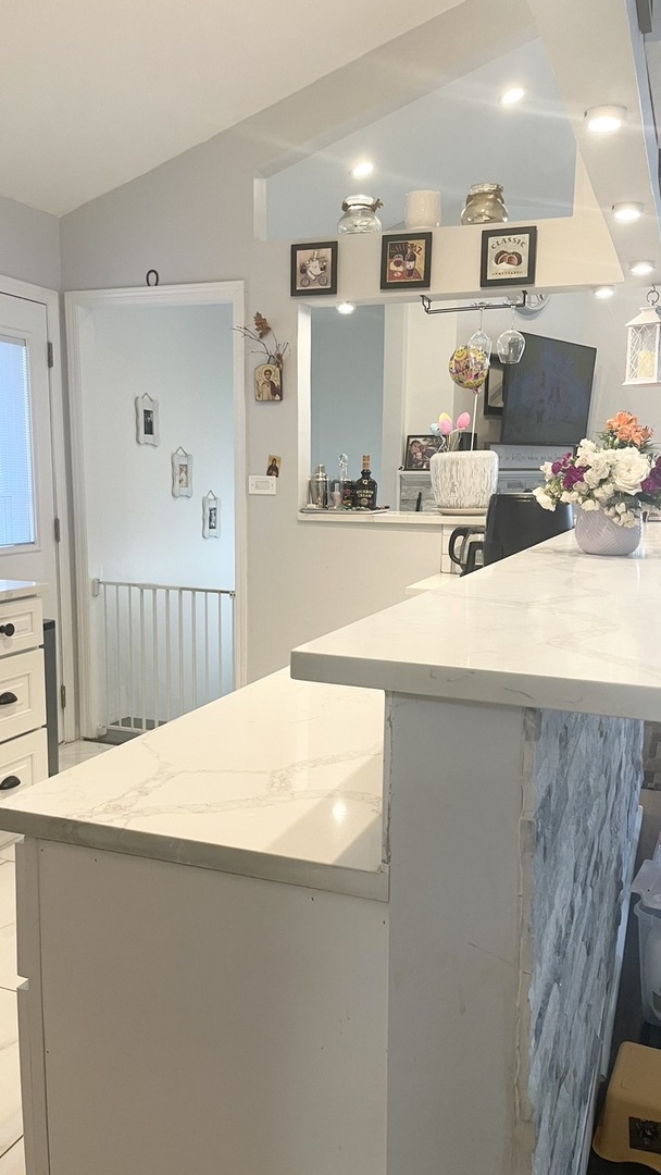 2749 Virginia Lane Glenview, IL 60025 - Photo 19 of 39 a bedroom with a bed and a large mirror