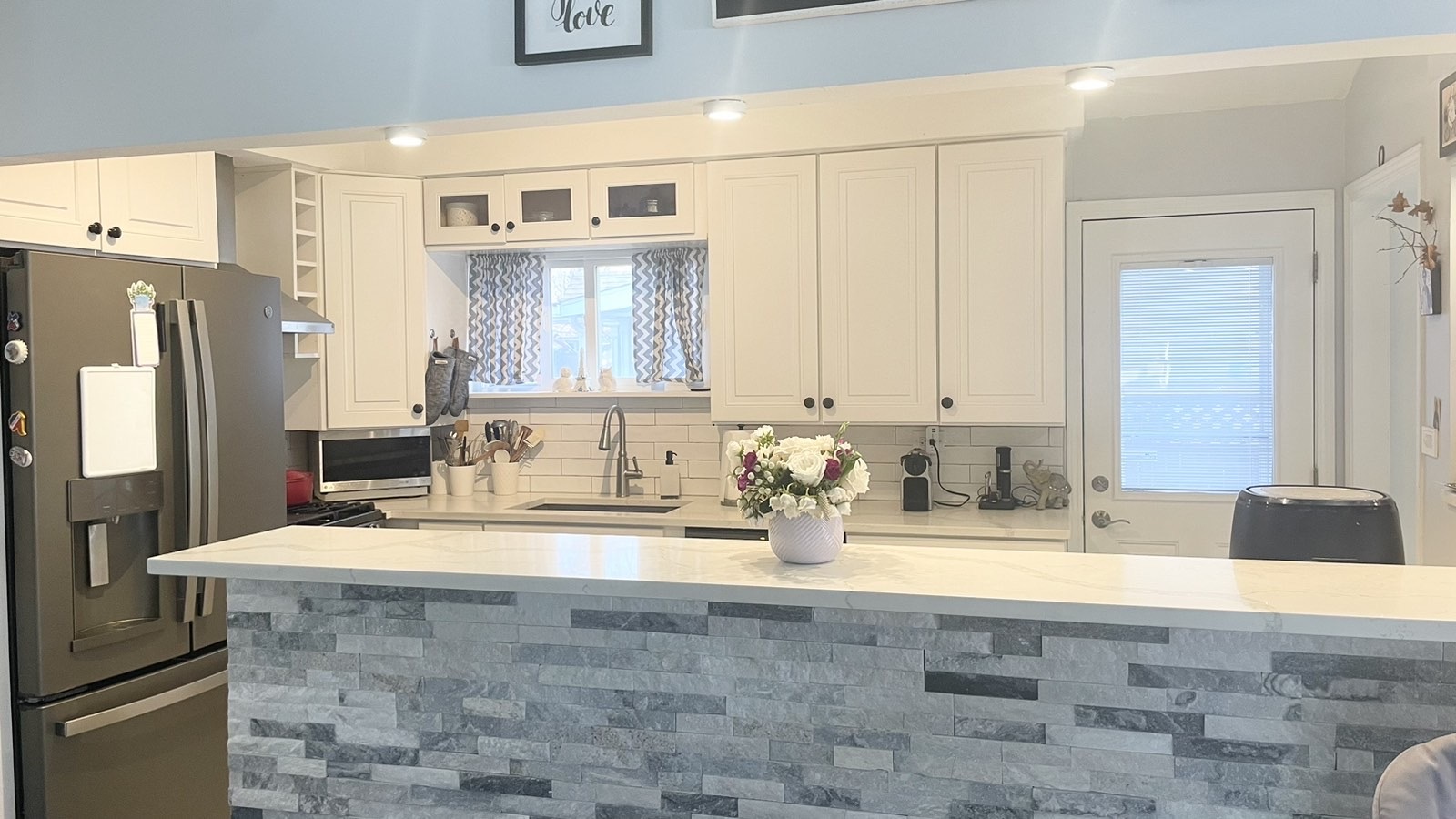 2749 Virginia Lane Glenview, IL 60025 - Photo 21 of 39 a bathroom with a sink double vanity and a mirror