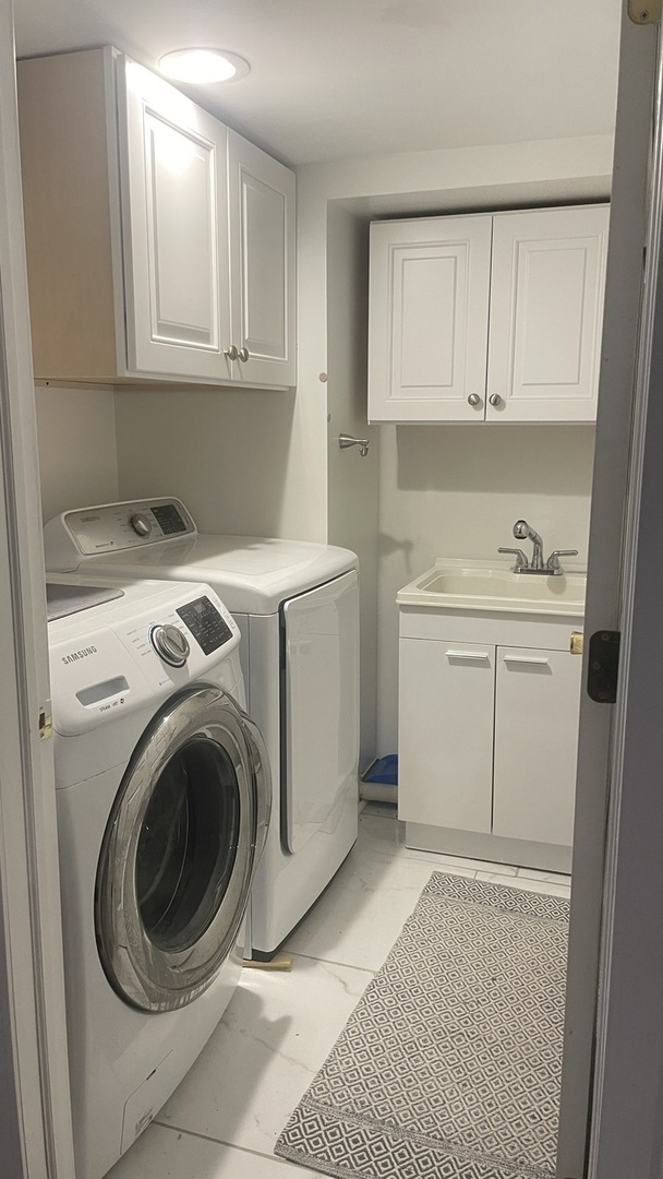 2749 Virginia Lane Glenview, IL 60025 - Photo 22 of 39 a utility room with sink dryer and washer