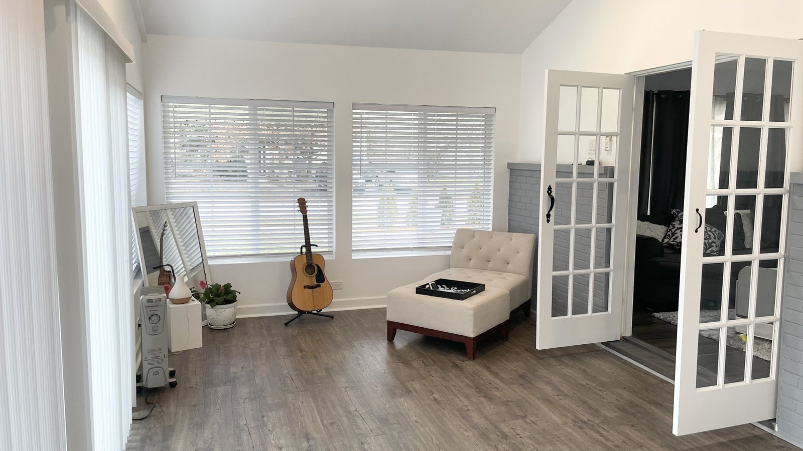 2749 Virginia Lane Glenview, IL 60025 - Photo 29 of 39 a living room with furniture floor to ceiling window and wooden floor