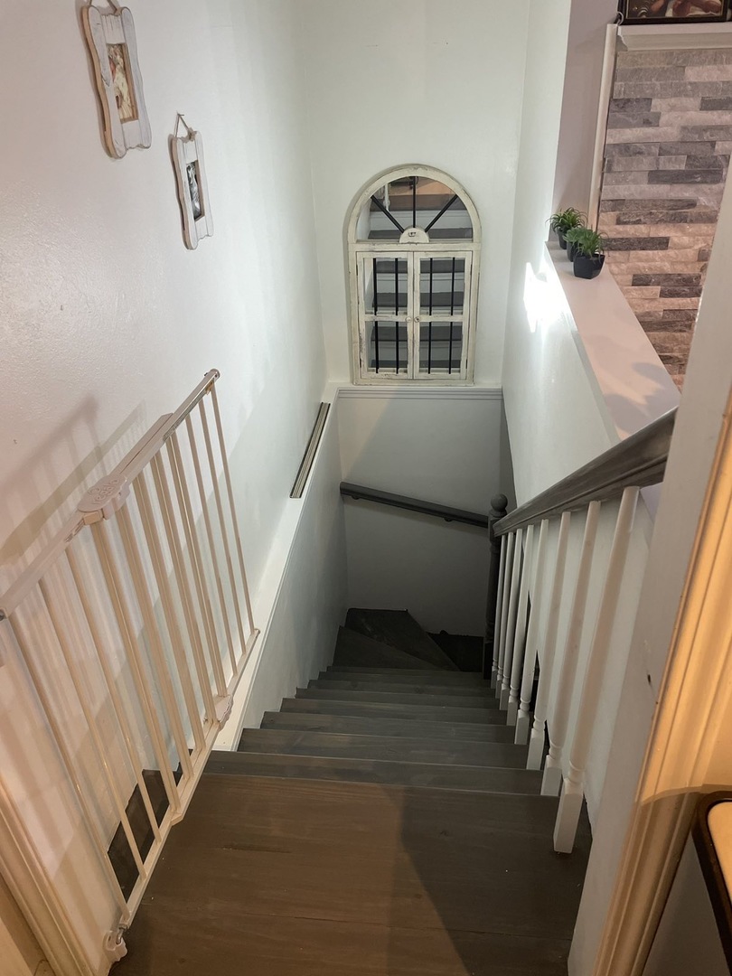 2749 Virginia Lane Glenview, IL 60025 - Photo 32 of 39 a view of entryway and hall with wooden floor
