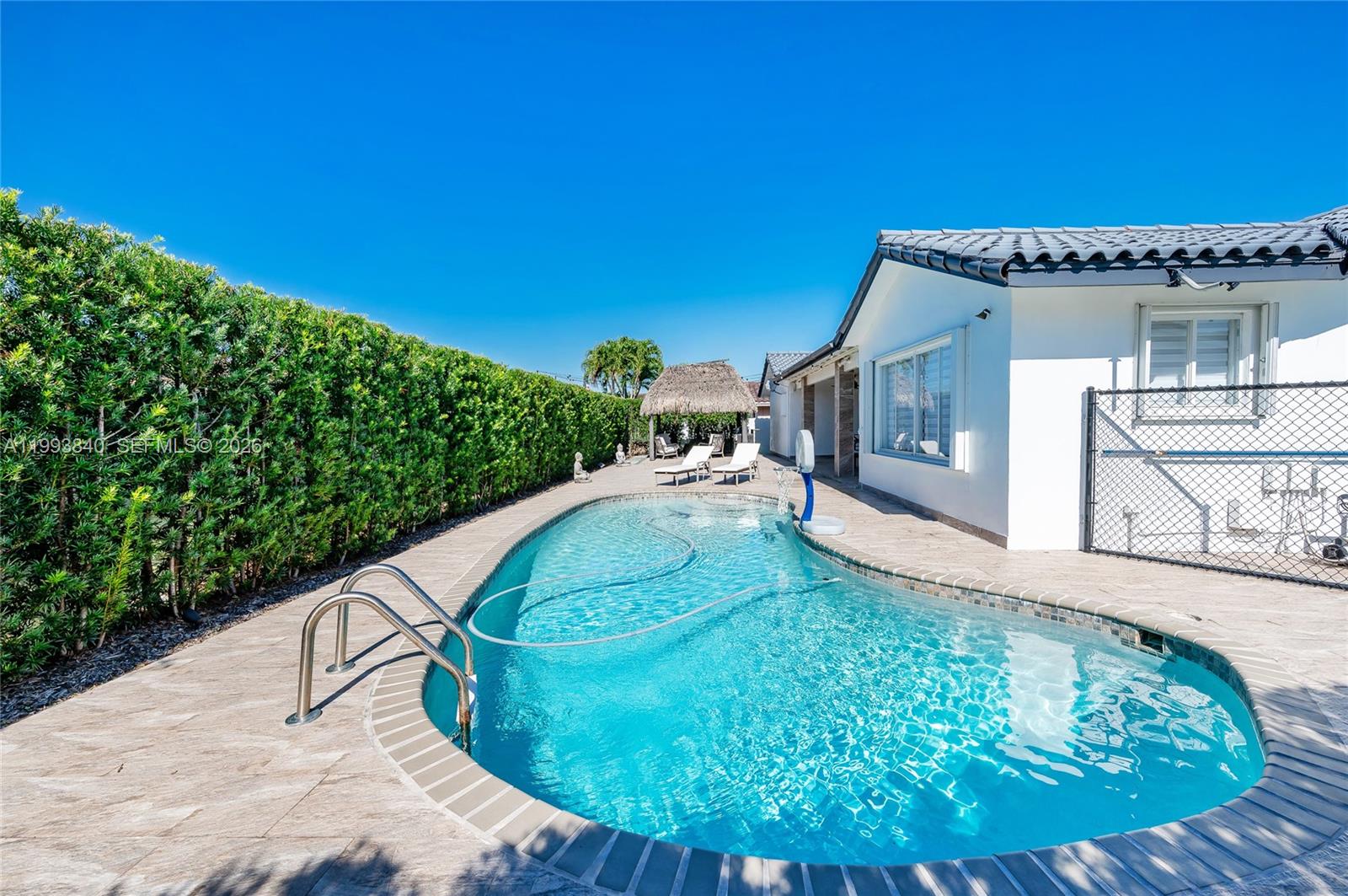 1820 Southwest 140th Place Miami, FL 33175 - Photo 19 of 22 a view of a house with a yard