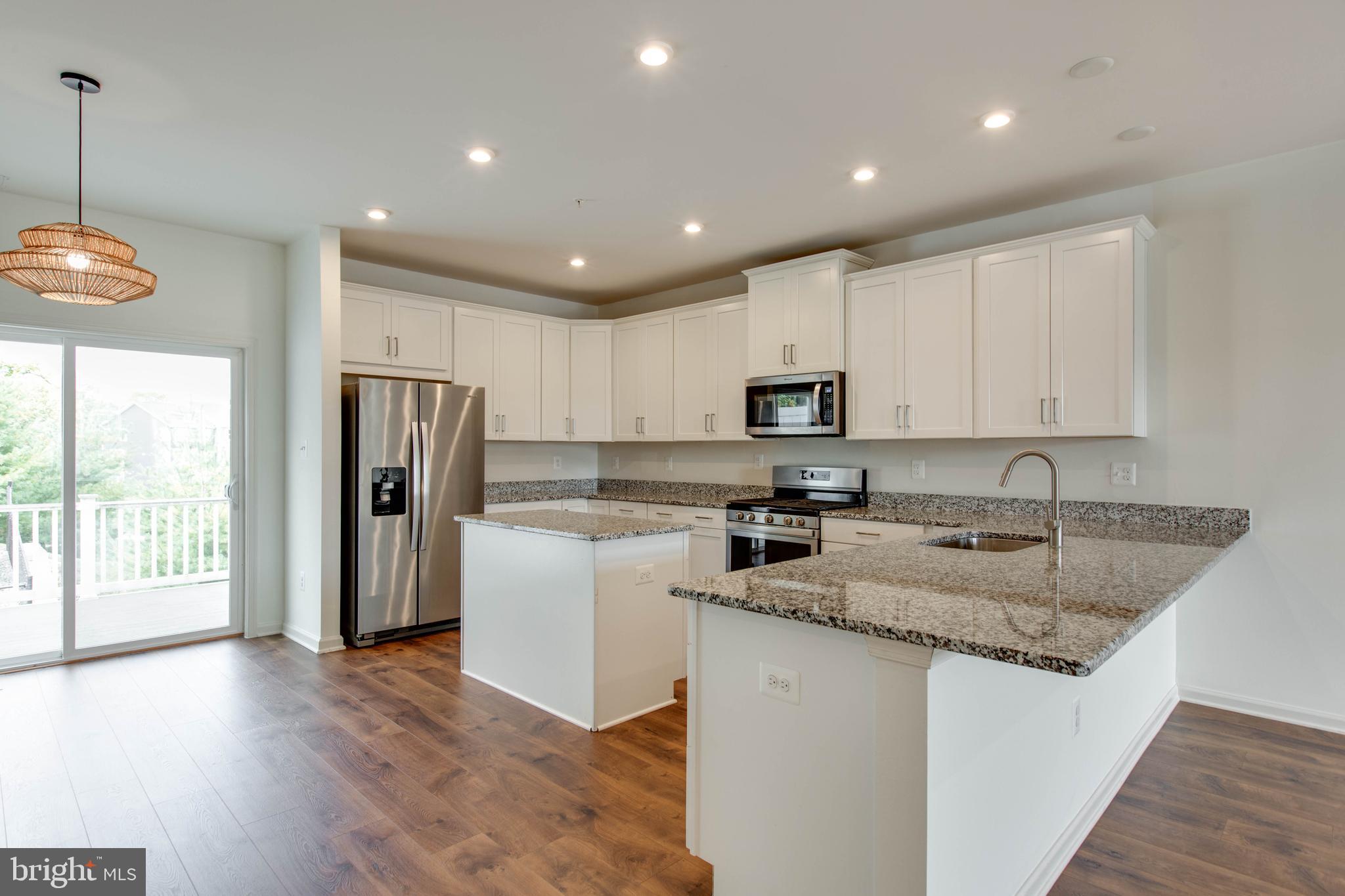 1922 Red Jasper Road Hanover, MD 21076 - Photo 13 of 49 a kitchen with refrigerator and window