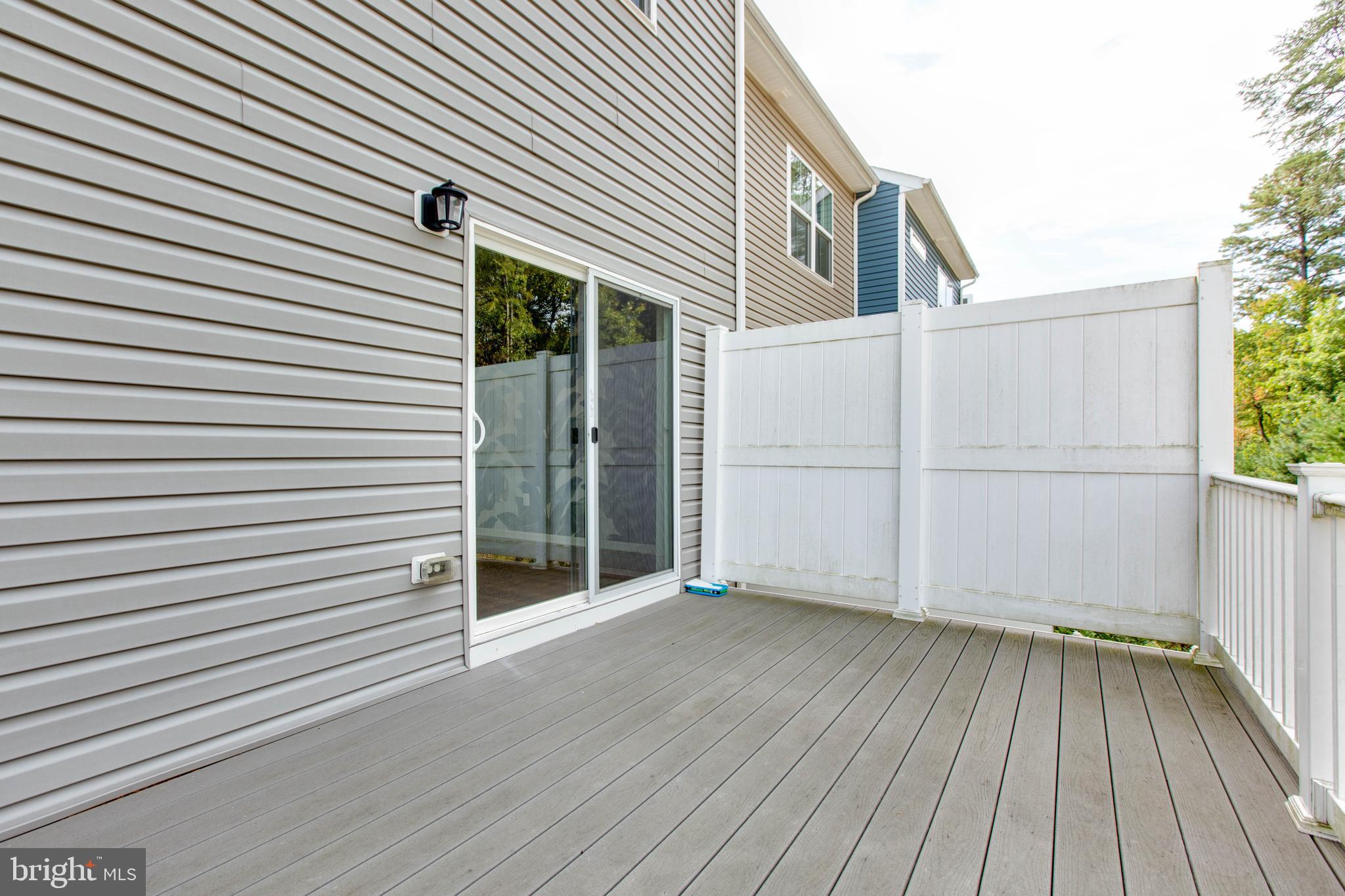 1922 Red Jasper Road Hanover, MD 21076 - Photo 20 of 49 a view of a house with a deck