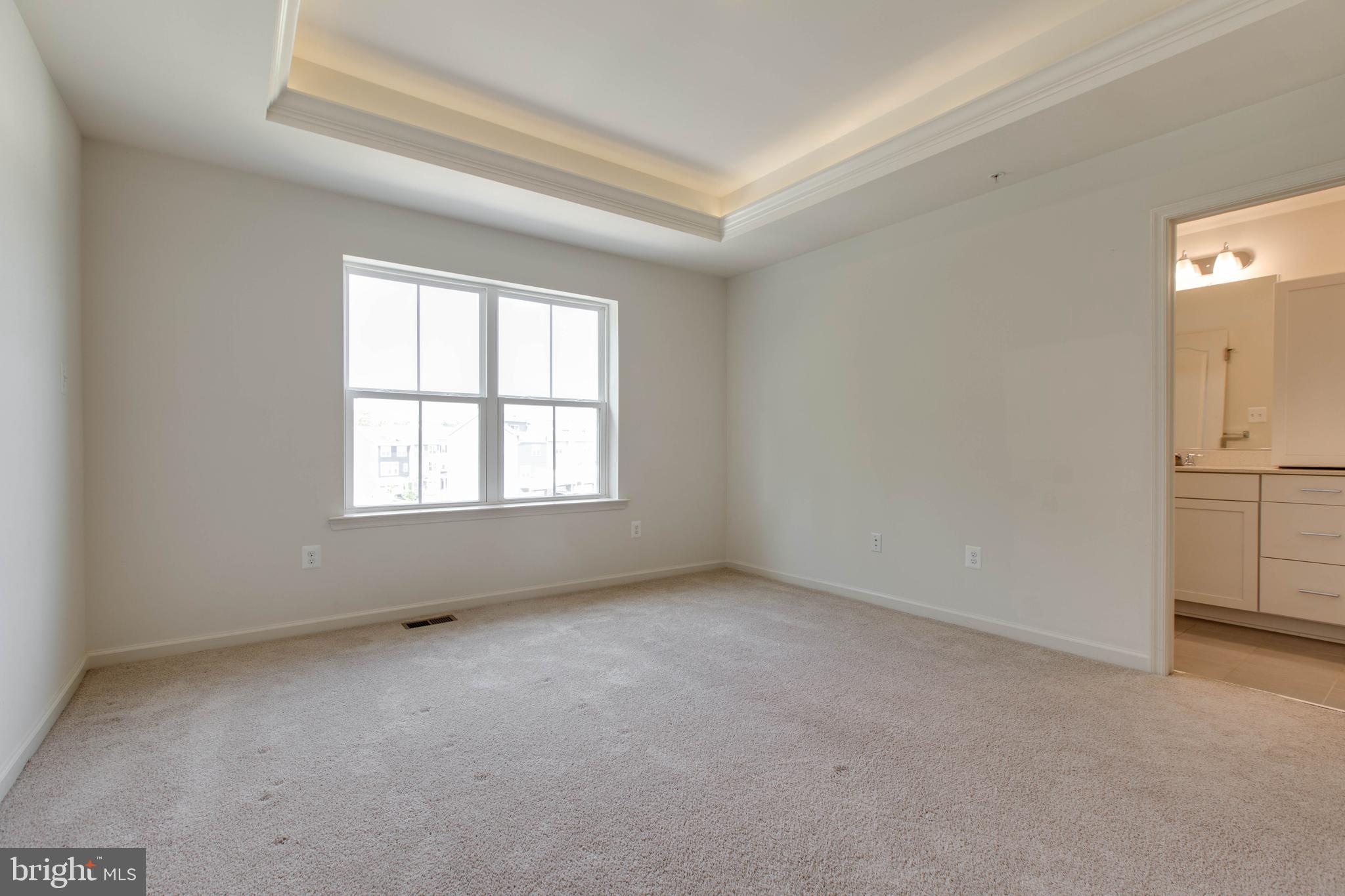1922 Red Jasper Road Hanover, MD 21076 - Photo 23 of 49 an empty room with windows and entrance