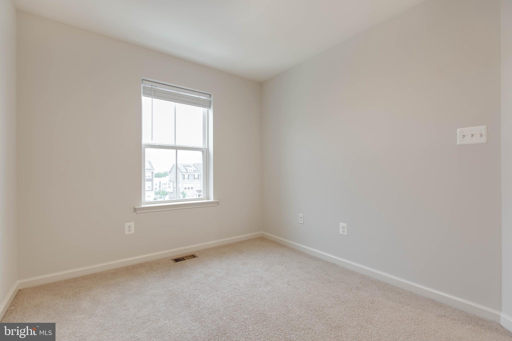 1922 Red Jasper Road Hanover, MD 21076 - Photo 28 of 49 an empty room with a window
