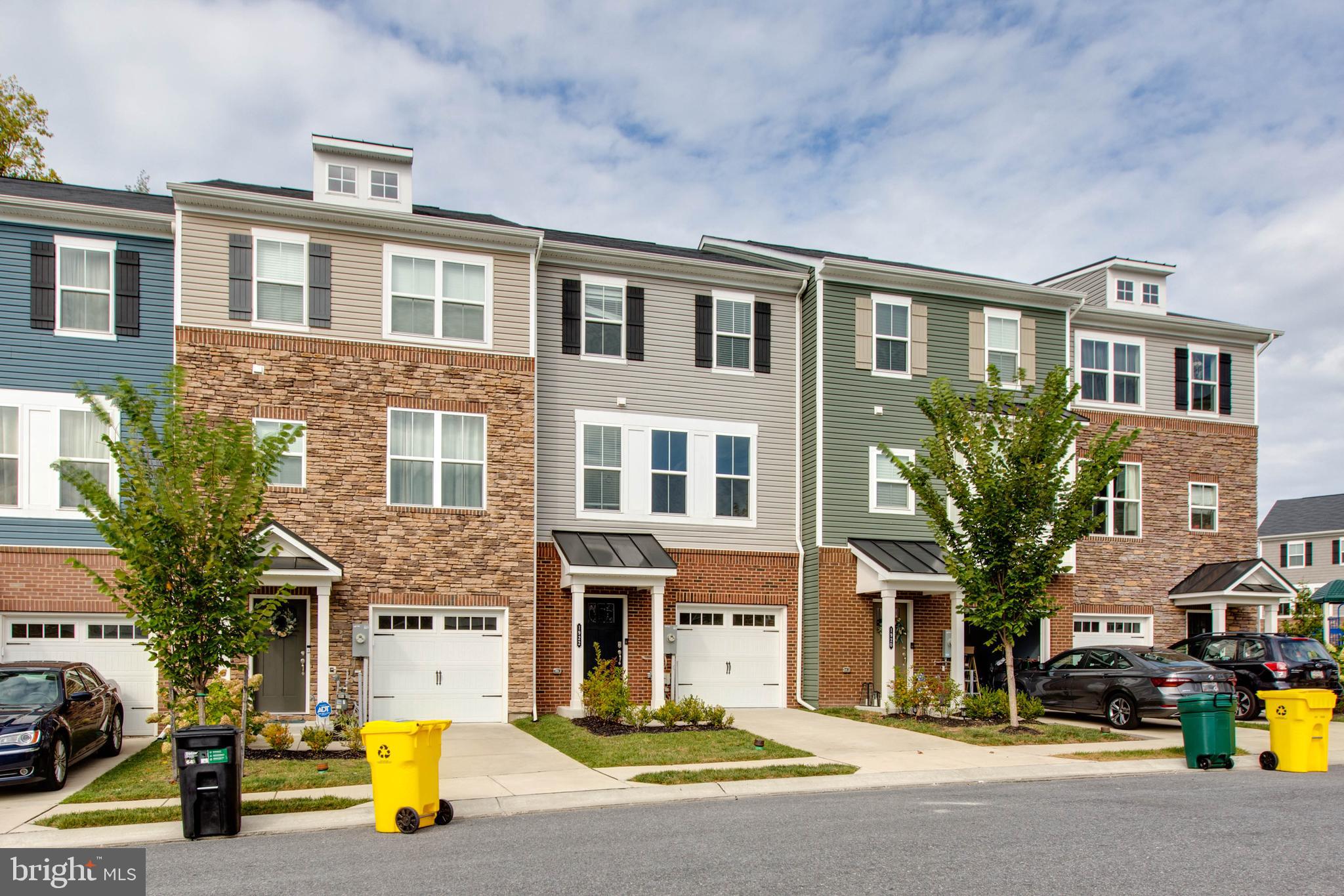 1922 Red Jasper Road Hanover, MD 21076 - Photo 3 of 49 a front view of a building with parking