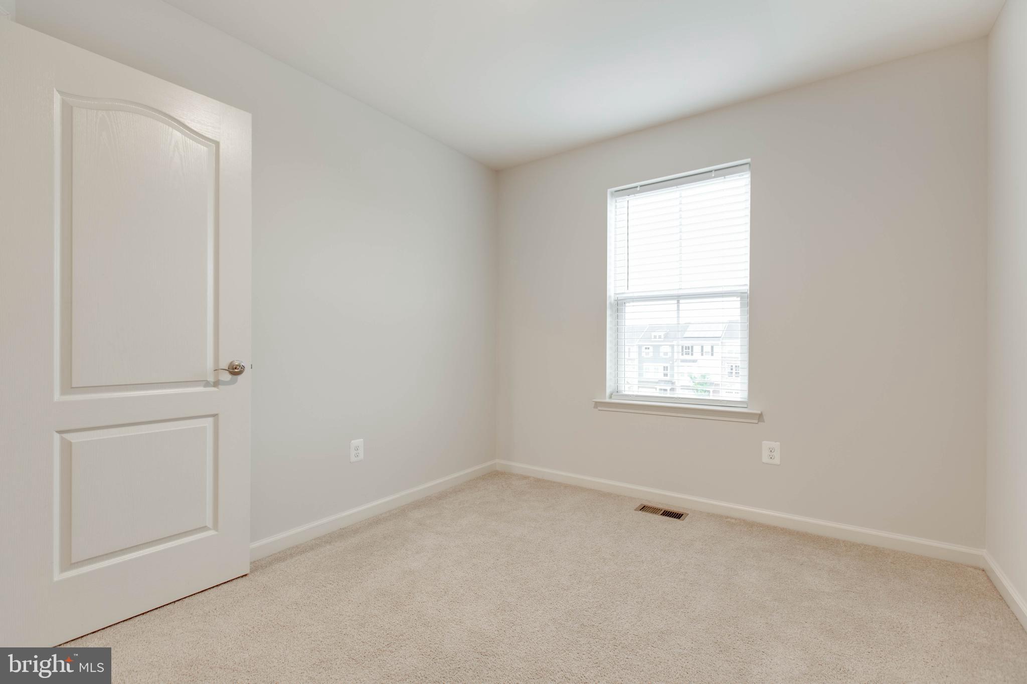 1922 Red Jasper Road Hanover, MD 21076 - Photo 31 of 49 an empty room with a window