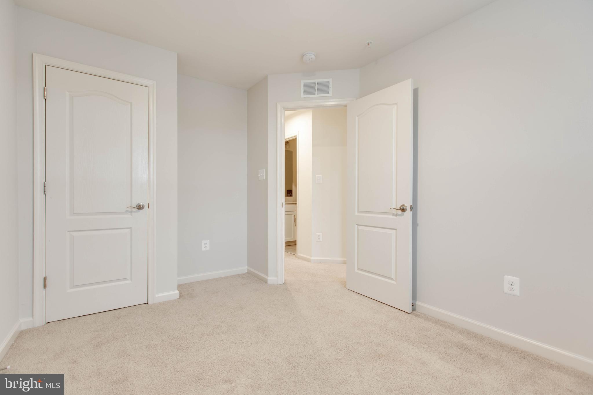 1922 Red Jasper Road Hanover, MD 21076 - Photo 32 of 49 an empty room with closet area