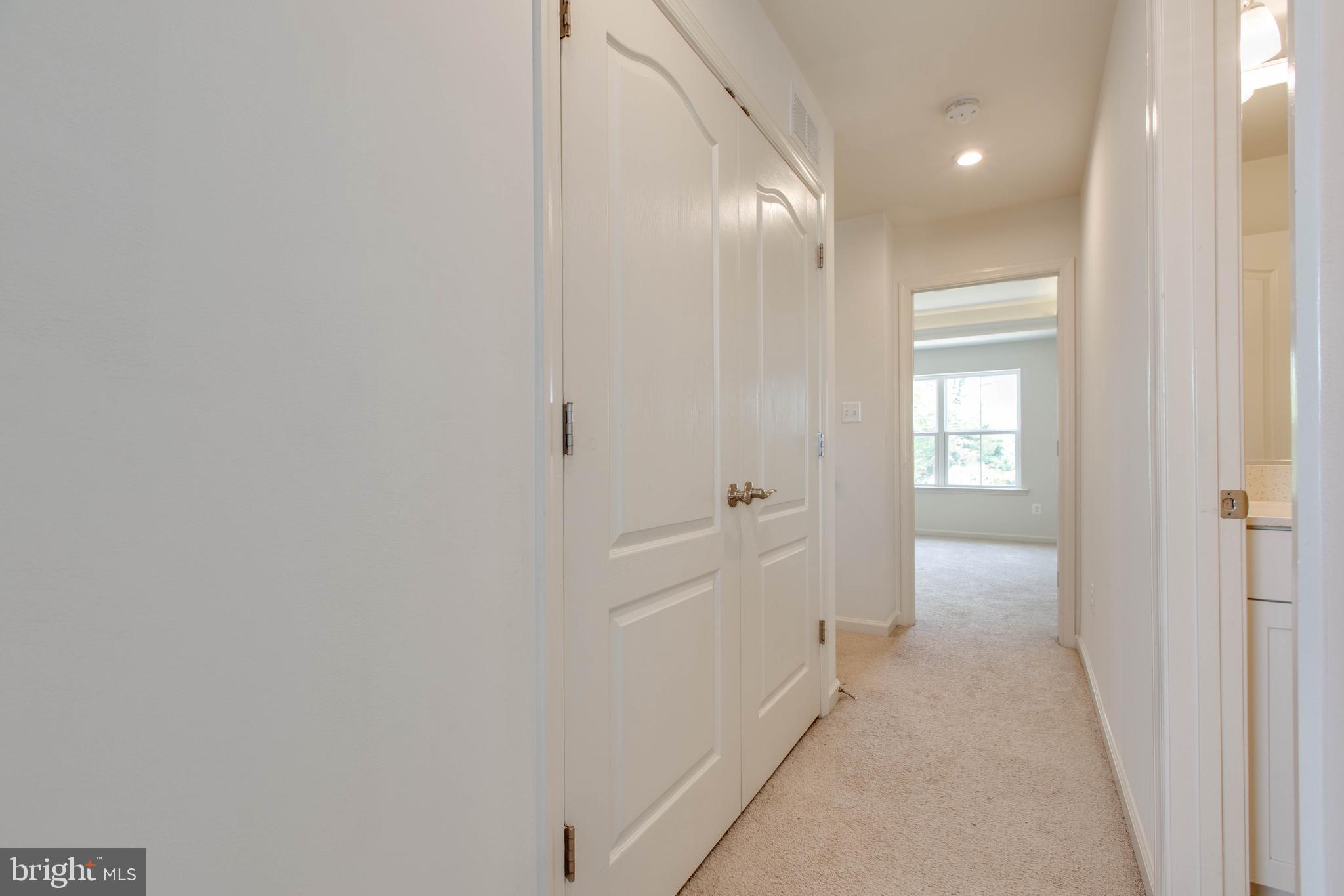 1922 Red Jasper Road Hanover, MD 21076 - Photo 35 of 49 a view of a hallway with wooden floor