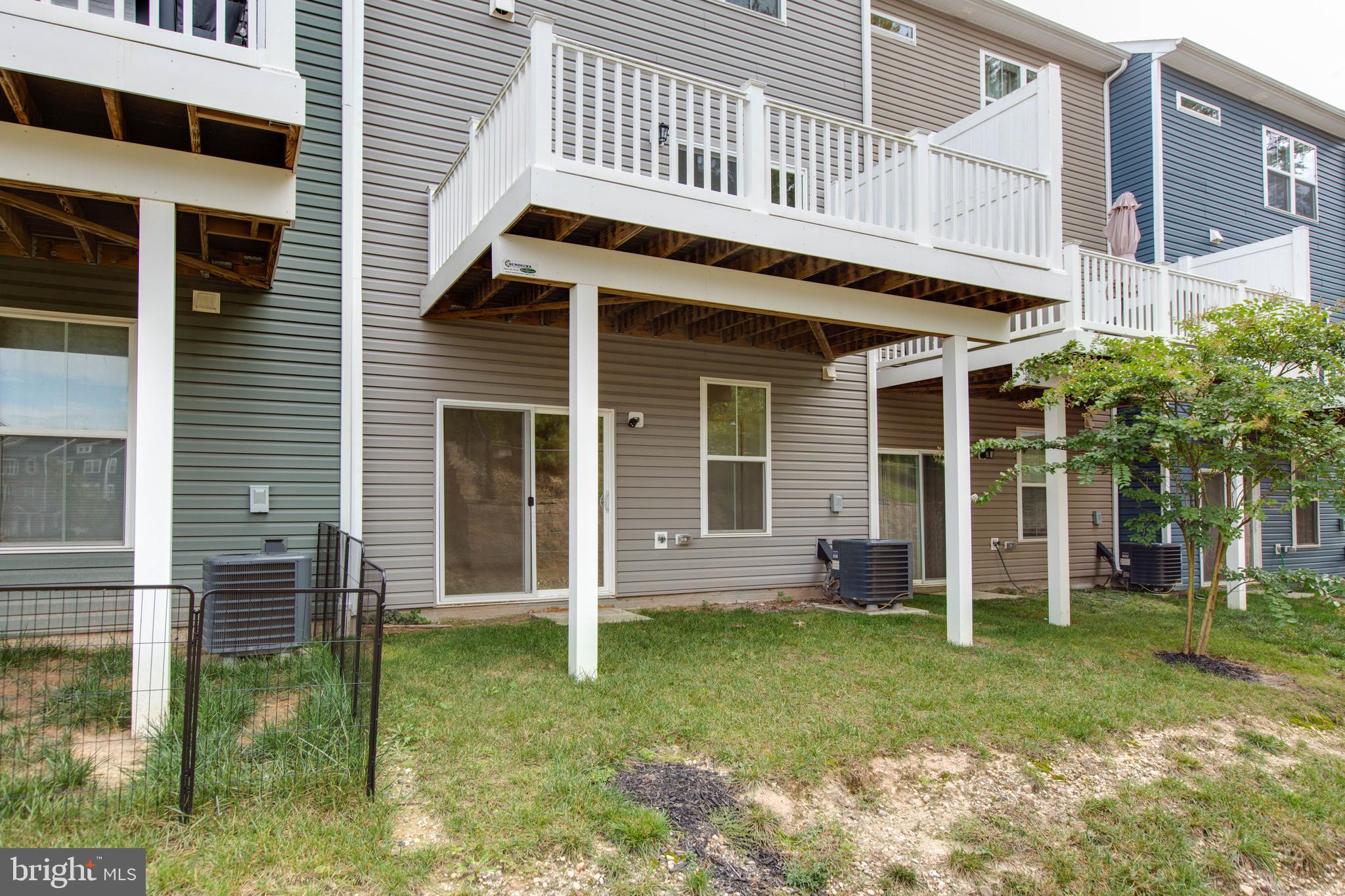 1922 Red Jasper Road Hanover, MD 21076 - Photo 45 of 49 a backyard of a house with lots of green space and plants