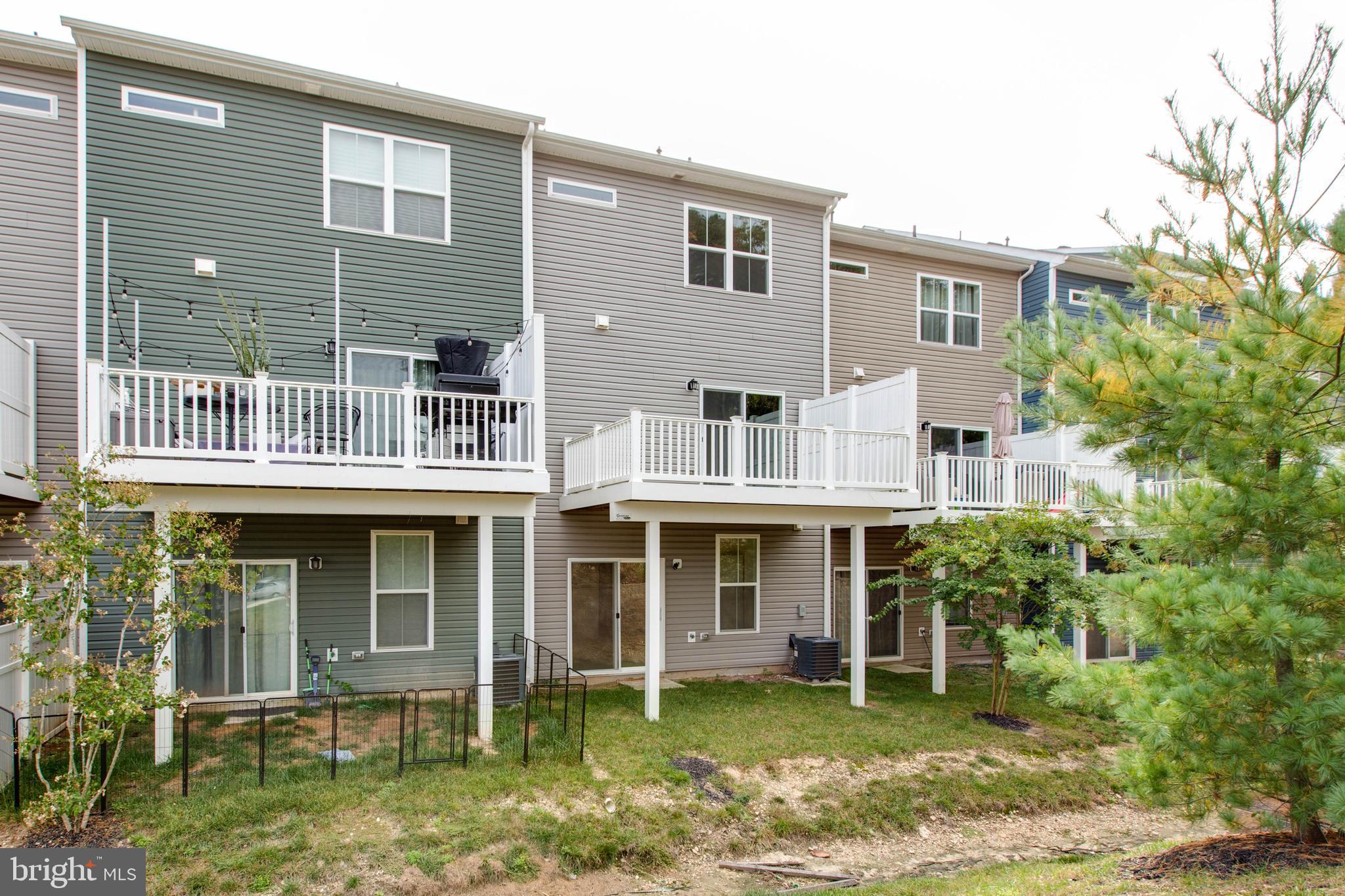 1922 Red Jasper Road Hanover, MD 21076 - Photo 46 of 49 a front view of a house with a yard