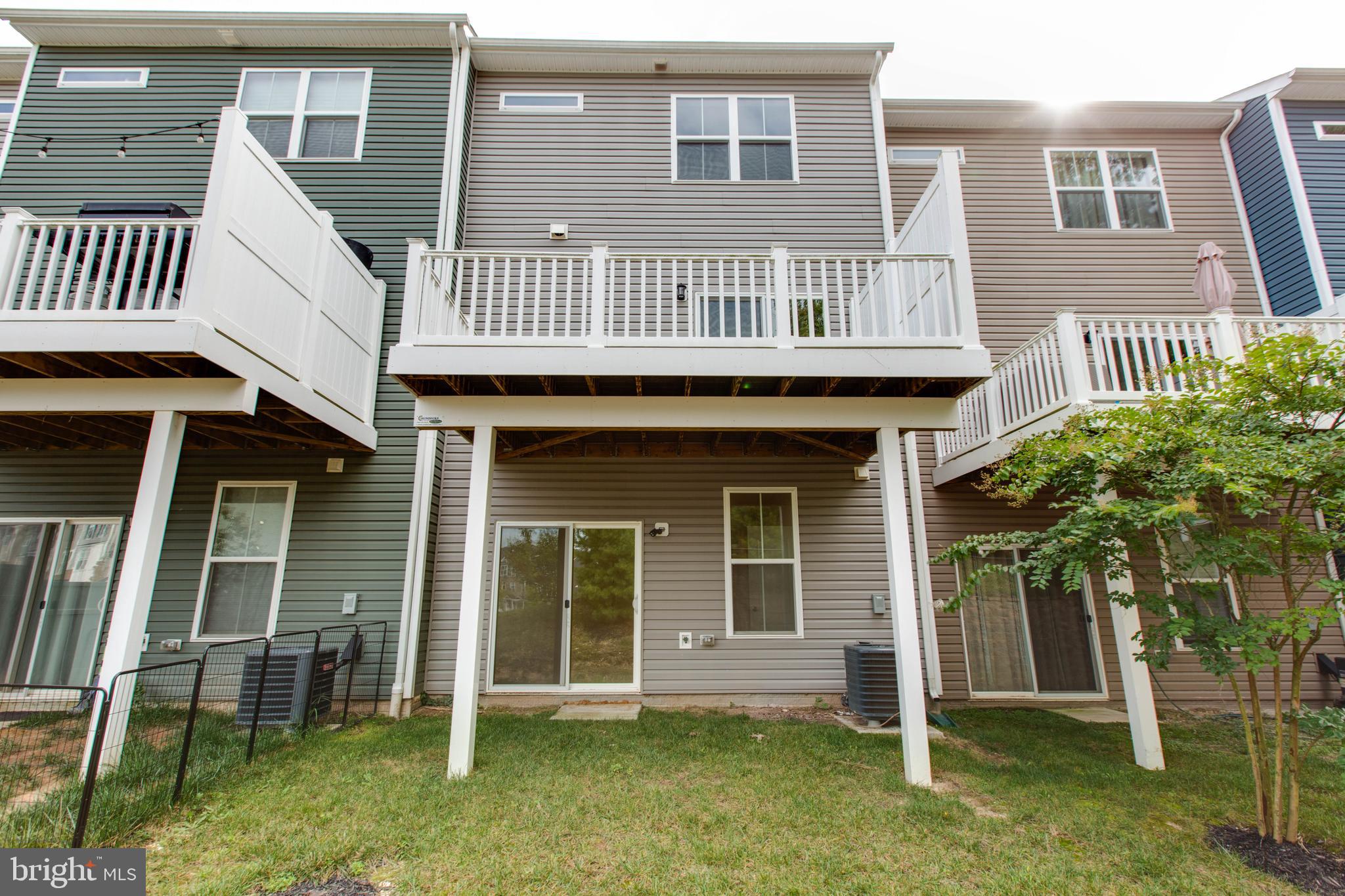 1922 Red Jasper Road Hanover, MD 21076 - Photo 47 of 49 a view of a house with a porch and a table