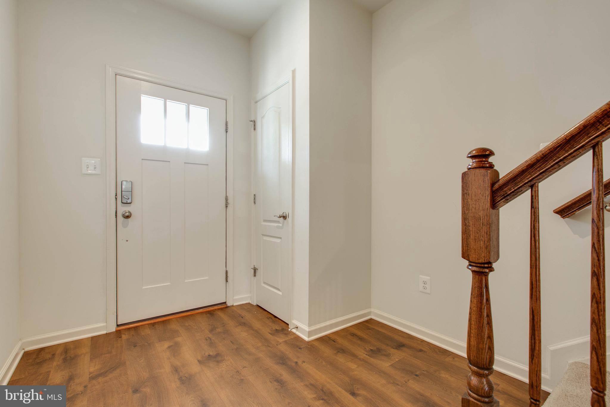 1922 Red Jasper Road Hanover, MD 21076 - Photo 5 of 49 a view of an entryway with wooden floor