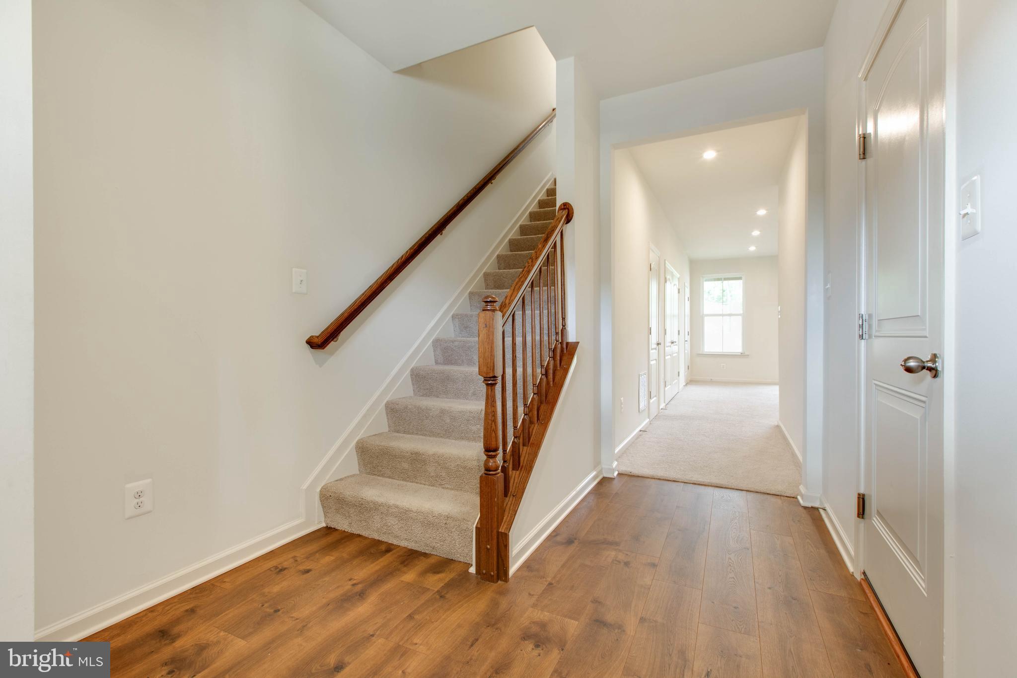 1922 Red Jasper Road Hanover, MD 21076 - Photo 6 of 49 a view of a hallway with wooden floor and entryway