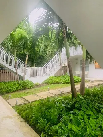 a view of a garden with a small yard