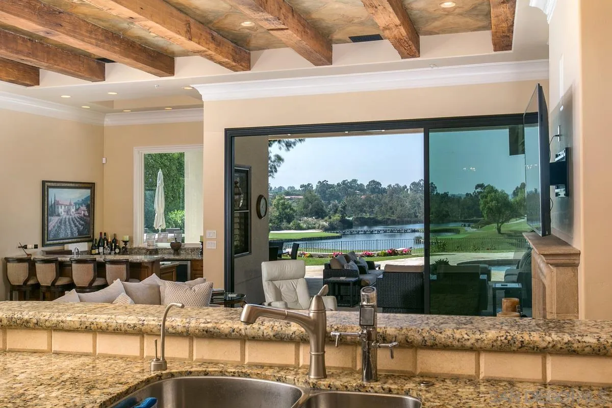 7330 St Andrews Road Rancho Santa Fe, CA 92067 - Photo 10 of 28 a living room with patio furniture