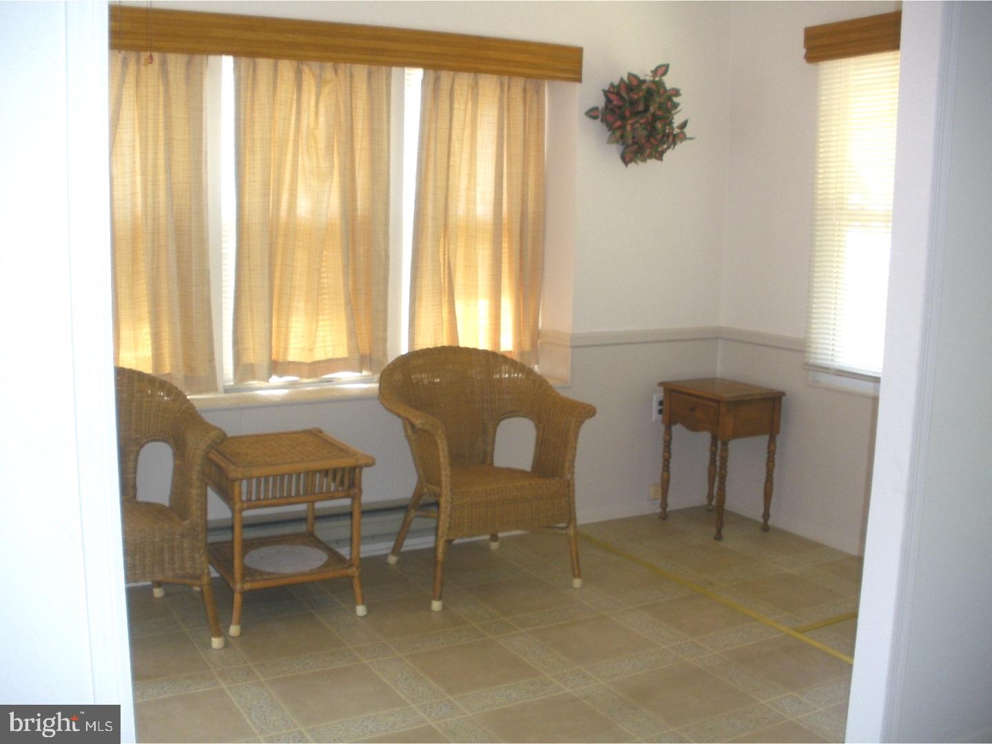 22 A Spring Street, Unit A Whiting, NJ 08759 - Photo 4 of 14 Sun Room