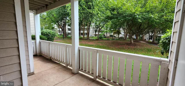a view of a porch with a yard