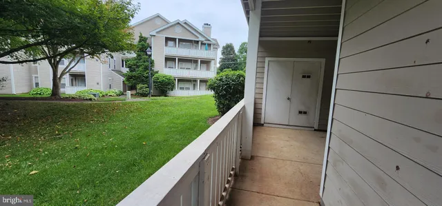 a view of backyard with green space
