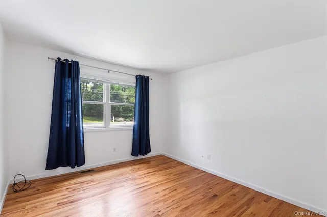 $990,000 | 12 Hampton Bays Drive, Hampton Bays, NY 11946