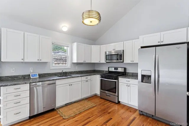 $990,000 | 12 Hampton Bays Drive, Hampton Bays, NY 11946