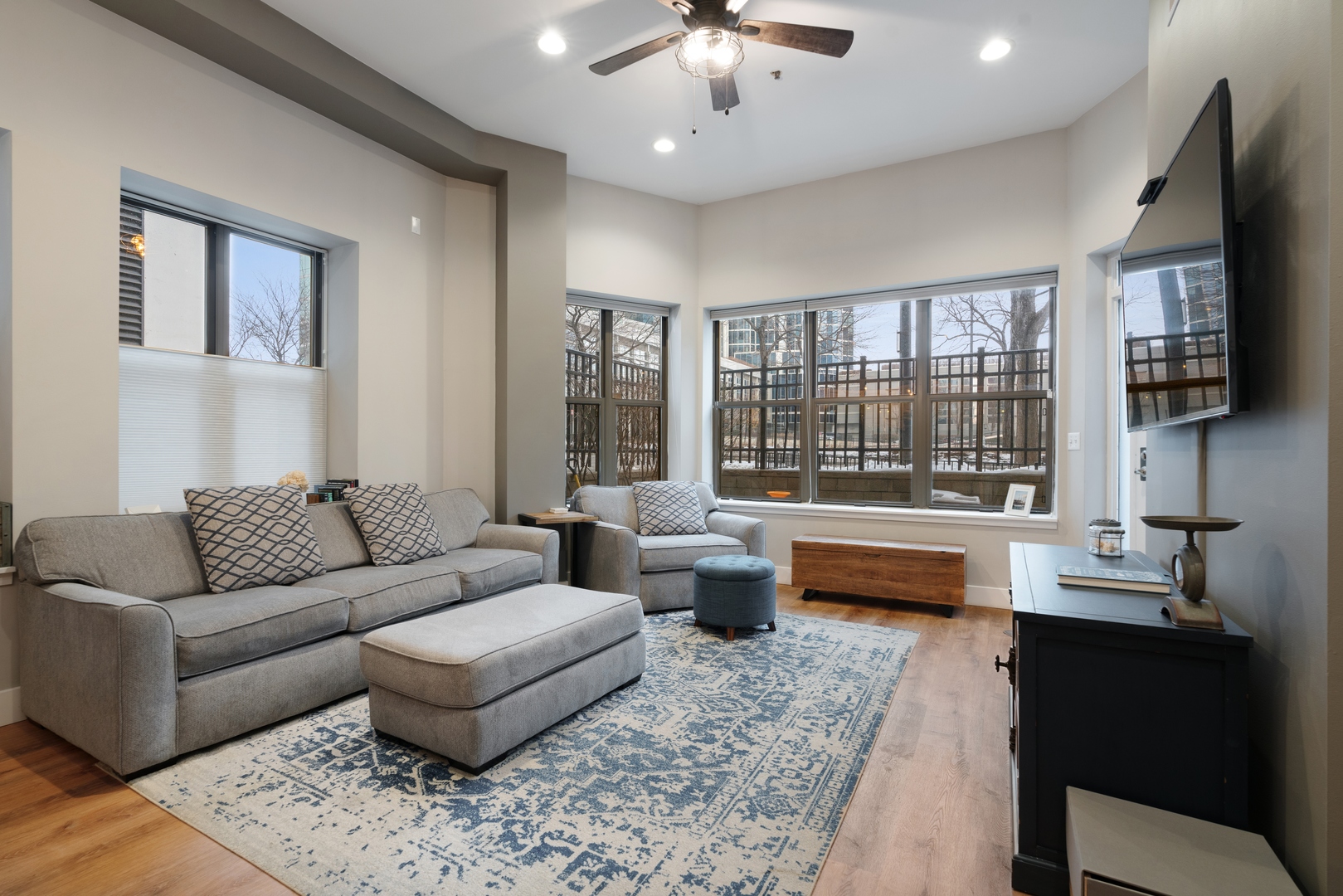 1250 South Indiana Avenue, Unit 101 Chicago, IL 60605 - Photo 3 of 16 a living room with furniture and a large window