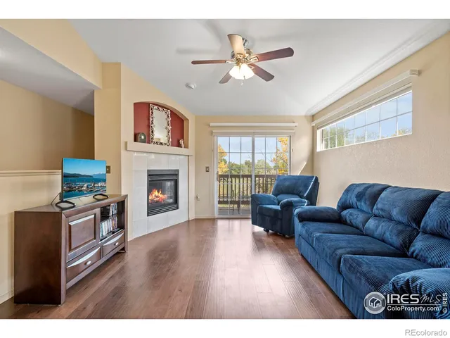a kitchen with stainless steel appliances a refrigerator and a stove top oven