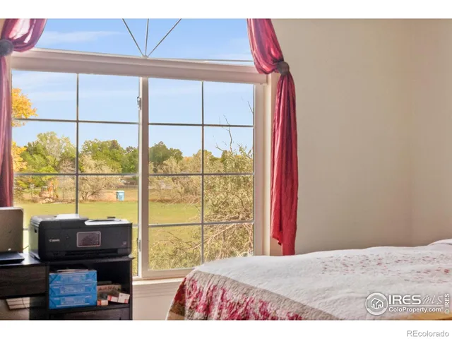 a bathroom with a sink mirror vanity and toilet