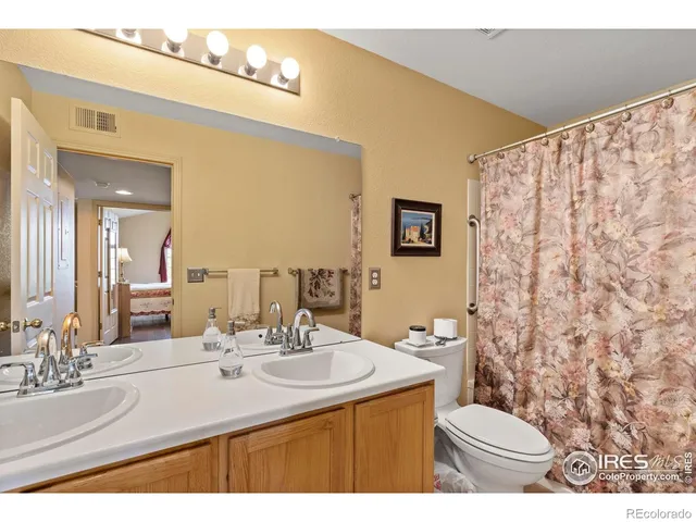 a bathroom with a sink and a shower
