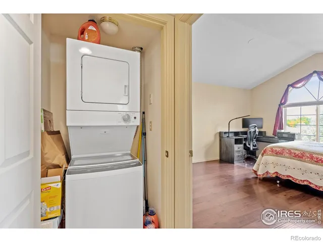 a view of a balcony with wooden fence