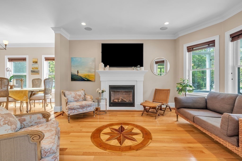 138 Webster Street Needham, MA 02494 - Photo 12 of 29 a living room with furniture fireplace and a flat screen tv