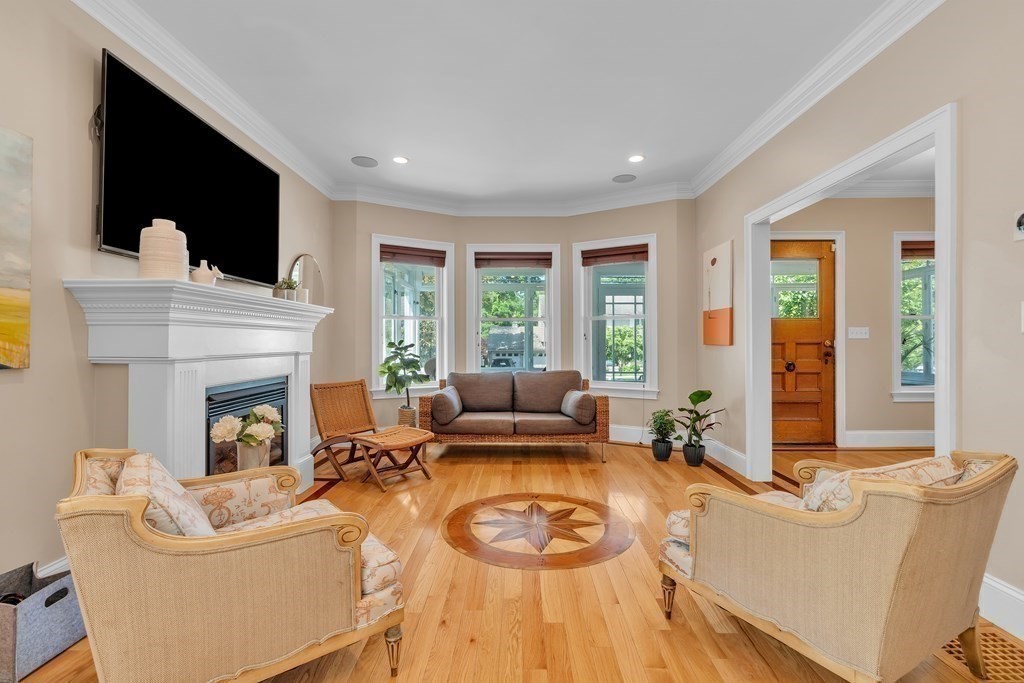 138 Webster Street Needham, MA 02494 - Photo 14 of 29 a living room with furniture fireplace and flat screen tv